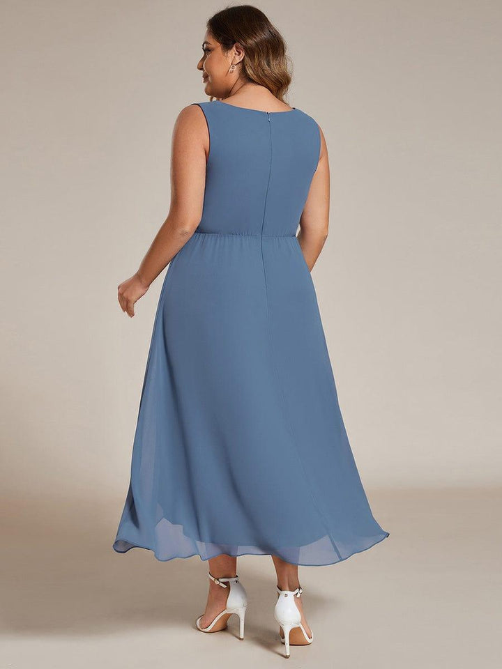 pretty IRYS|Plus Size Sleeveless Chiffon High-Low Wedding Guest Dress with Waist Applique